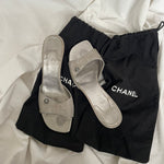 Rare Chanel CC logo travel line mules.