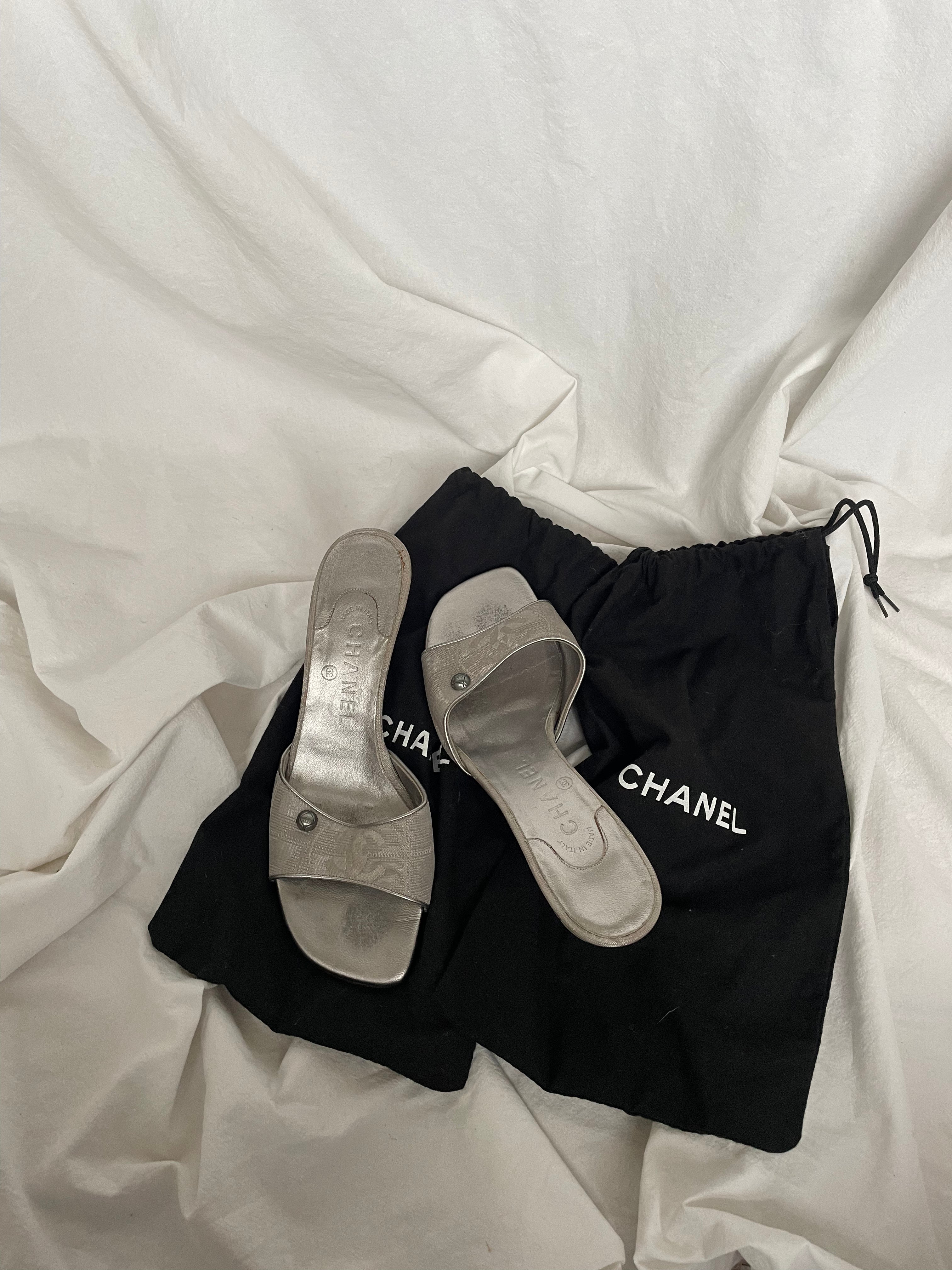 Rare Chanel CC logo travel line mules.