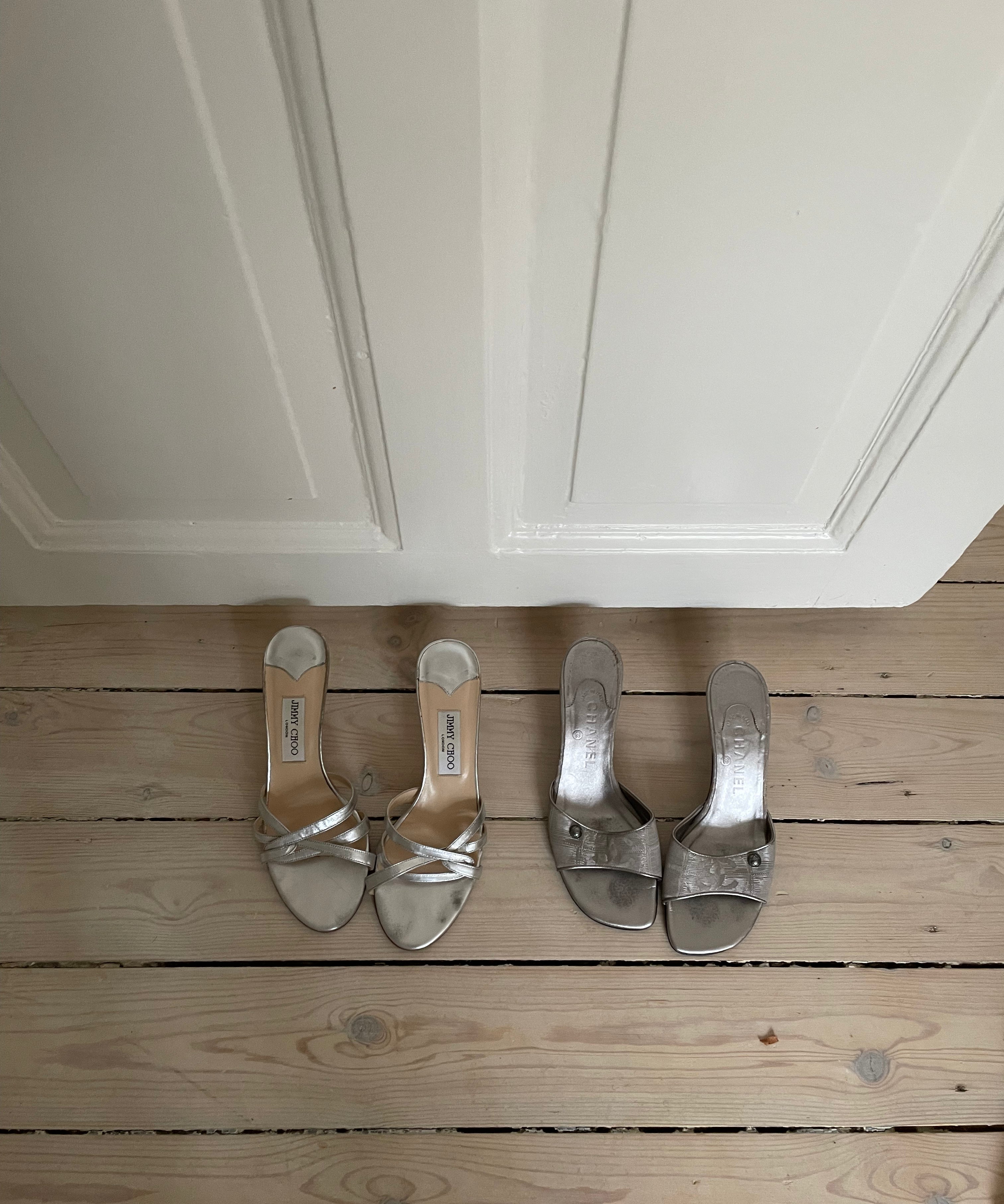 Rare Chanel CC logo travel line mules.