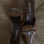 Prada buckle kitten heels. Vintage Prada heels with a pointed toe in a tan color with silver details.