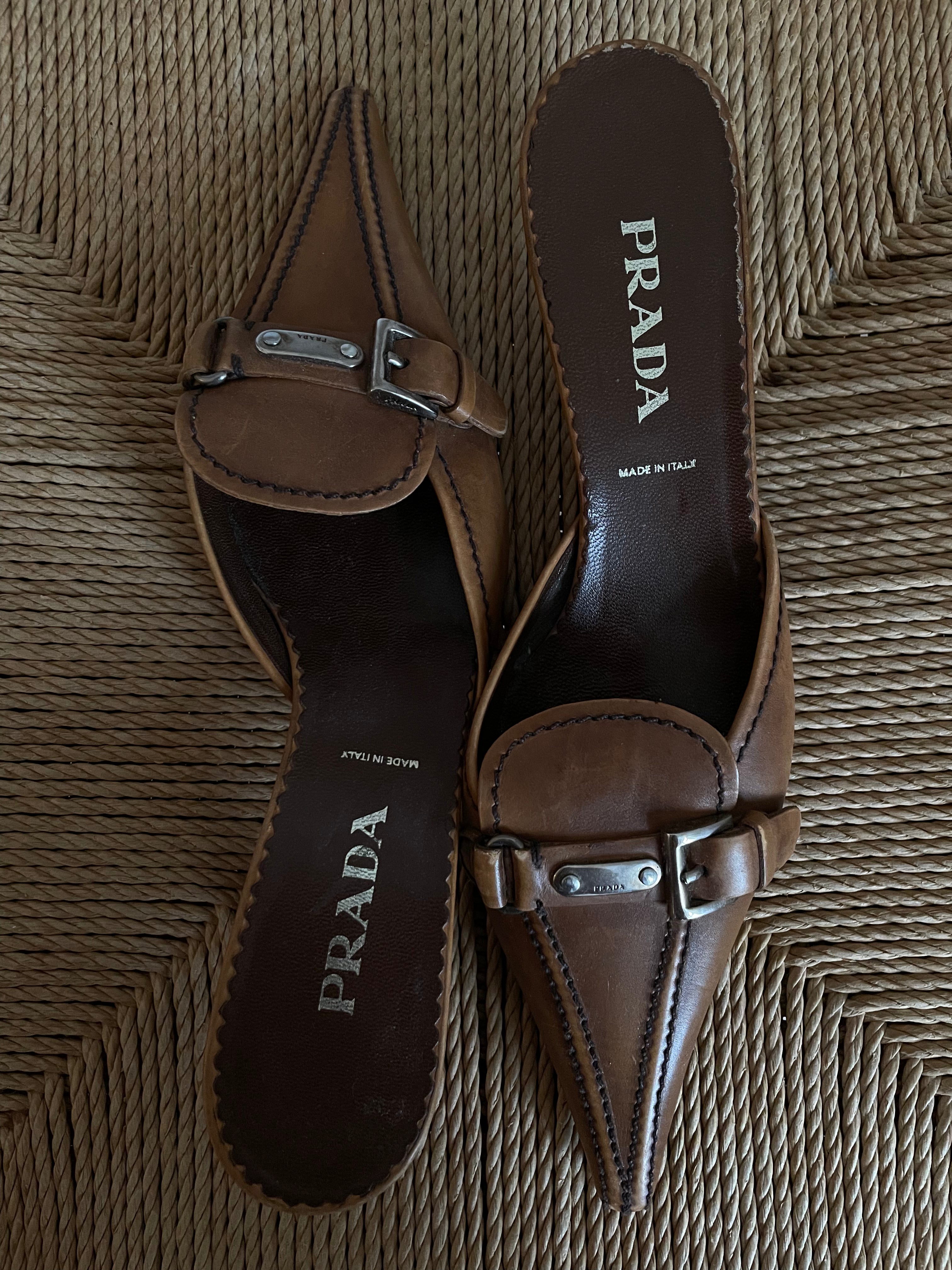 Prada buckle kitten heels. Vintage Prada heels with a pointed toe in a tan color with silver details.