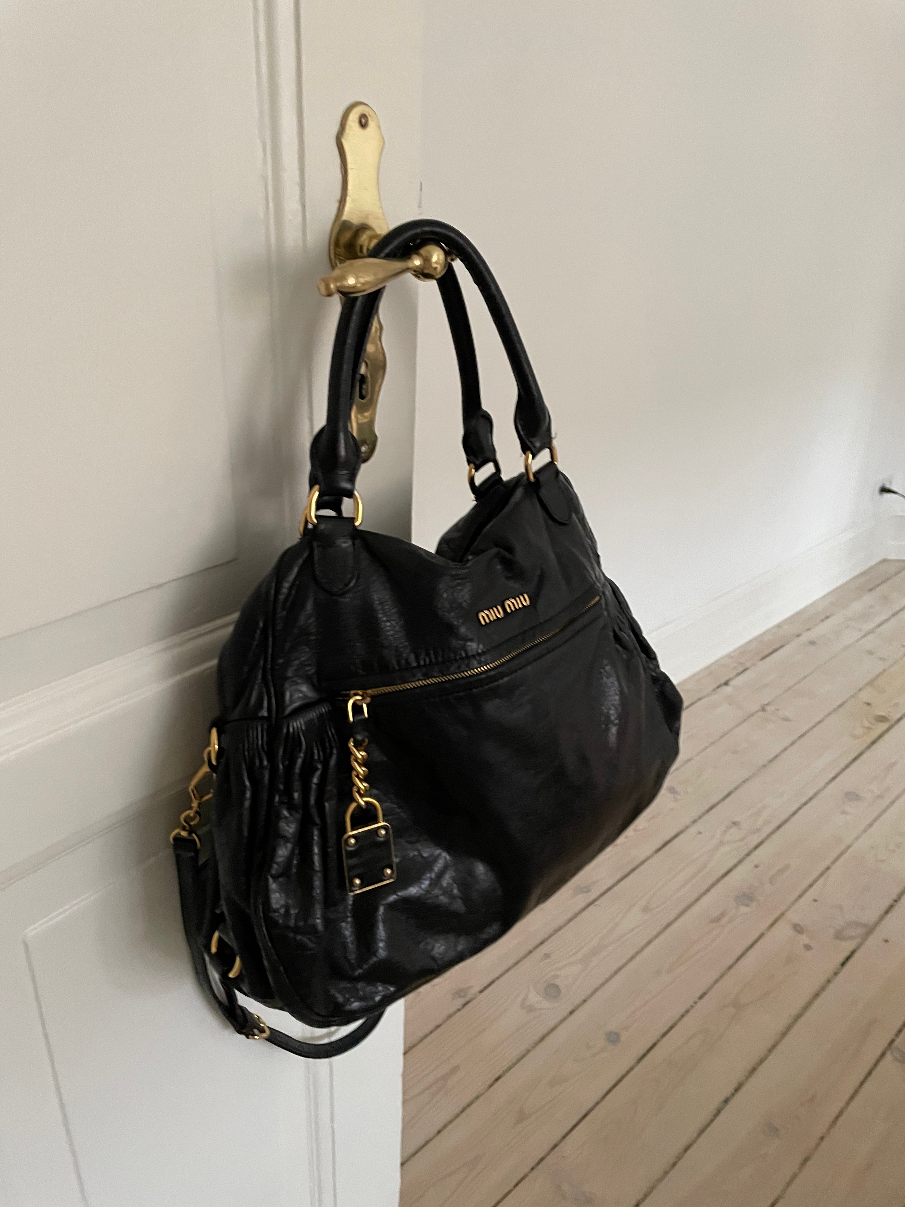 Miu Miu black nappa leather bag in a great condition.