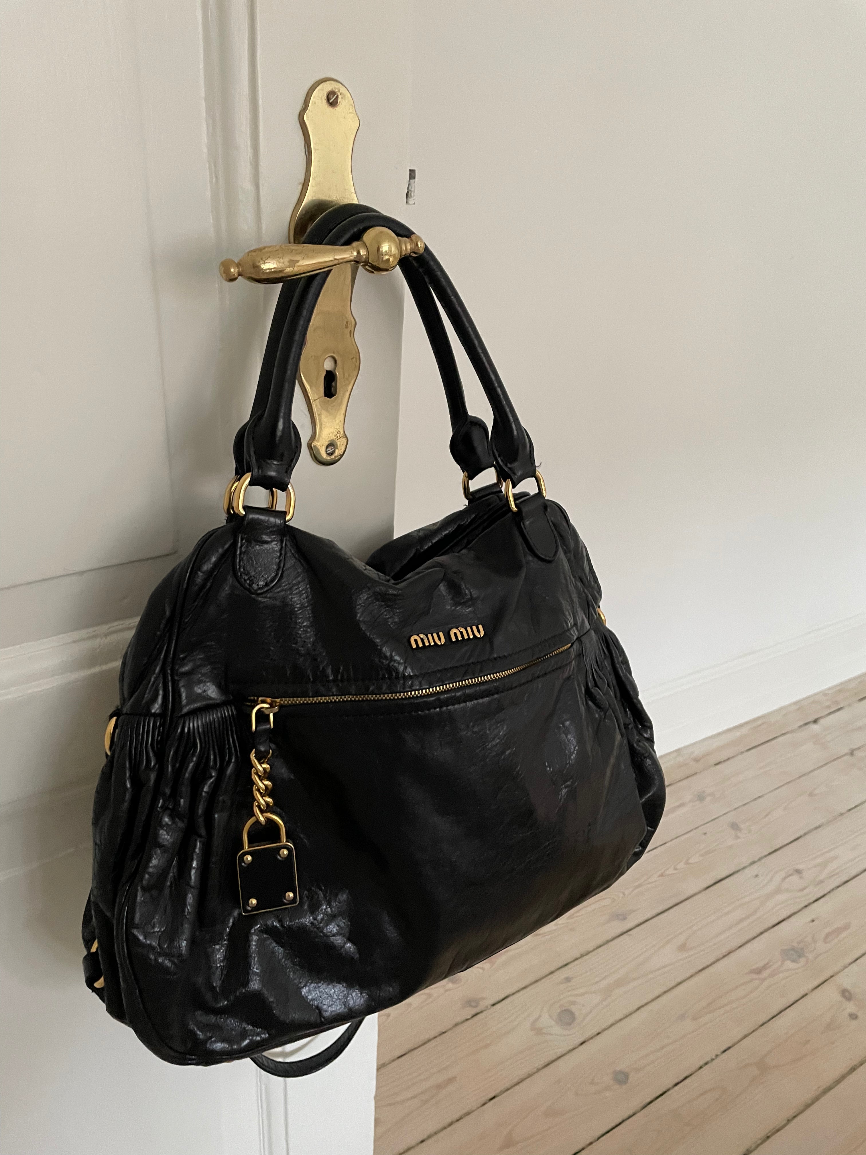 Miu Miu black nappa leather bag in a great condition.