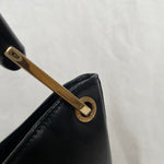 Vintage Gucci Bamboo bag with black handle and gold hardware.