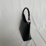 Vintage Gucci Bamboo bag with black handle and gold hardware.