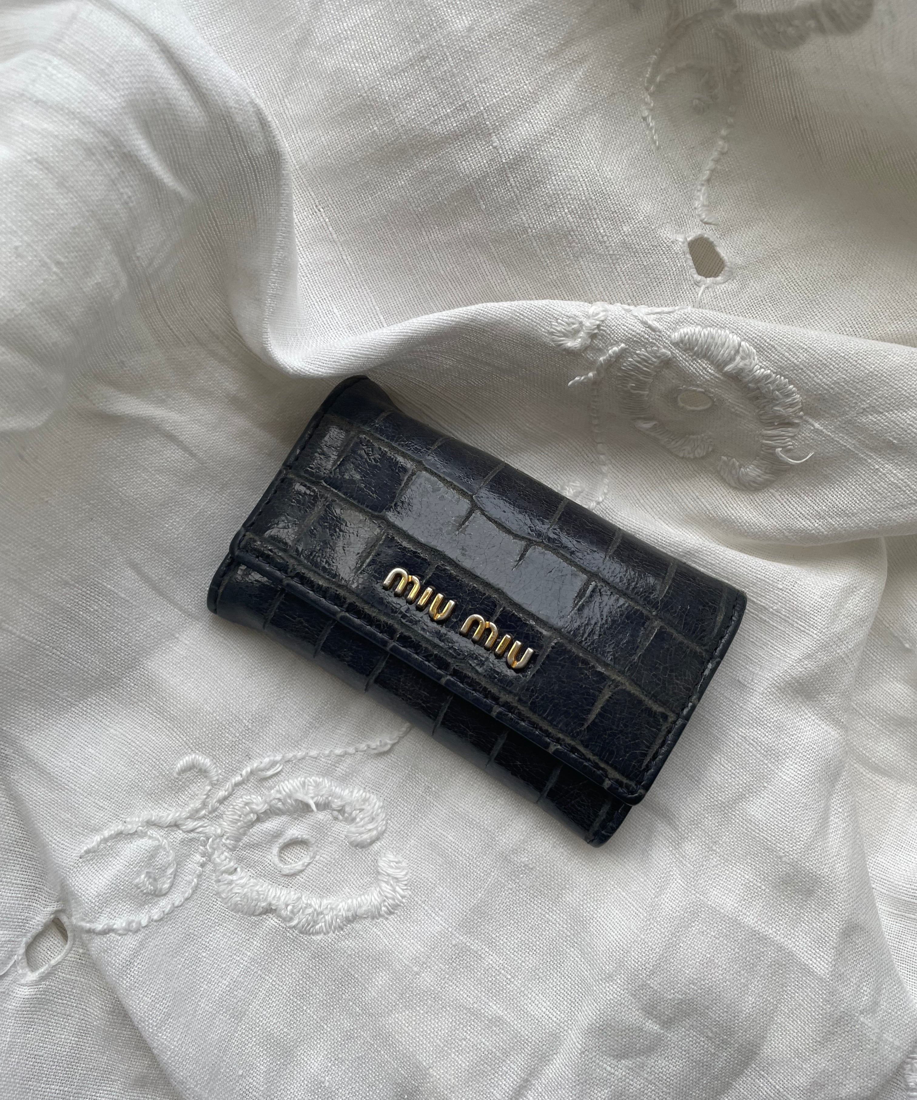 Beautiful key wallet from Miu Miu in navy leather.
