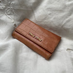 Beautiful Miu Miu key wallet in pink leather. Shows signs of wear on the hardware but is in a perfect working condition.