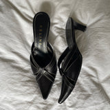 Celine heels in leather with white stitching. They show signs of wear but still have many wears left.