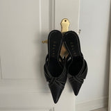 Celine heels in leather with white stitching. They show signs of wear but still have many wears left.