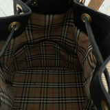 Vintage Burberrys bucket bag featuring signature canvas in the interior. The bag is overall in a good condition but the leather strap show signs of wear.&nbsp;